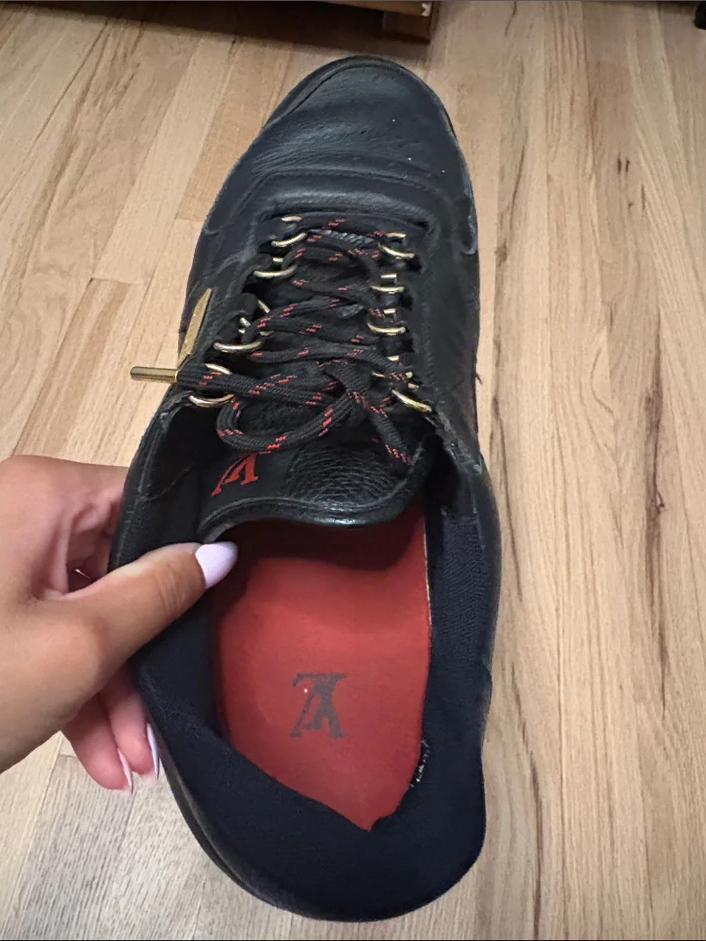 Louis Vuitton Black Leather Men's Sneakers with Red Insoles and Gold Accents